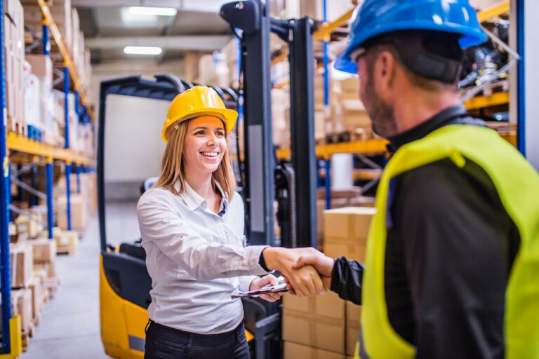 Young,Warehouse,Workers,Working,Together.